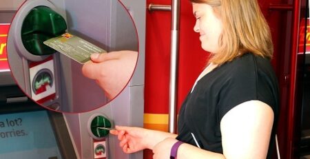 Woman using CIBC ATM.