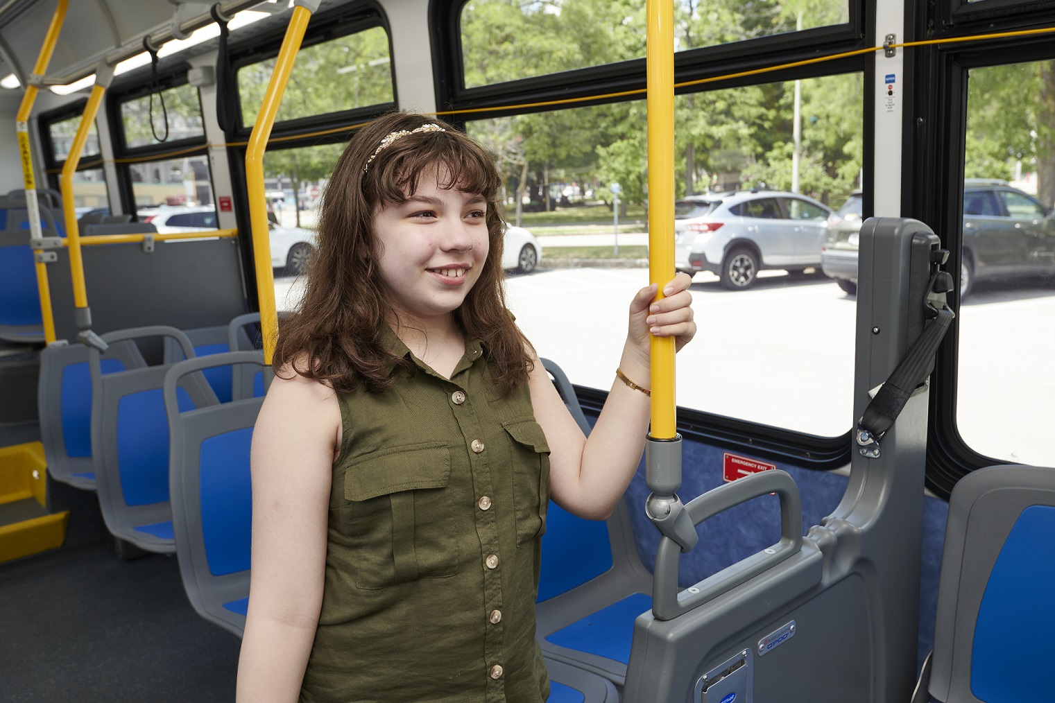 young woman riding the bus